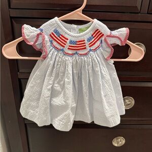 Classic Whimsy Smocked Patriotic Baby Dress with Flag Design